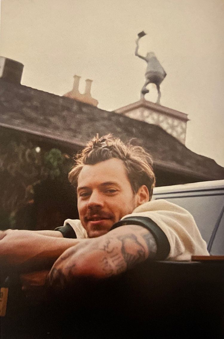 Harry Styles' 70s-Inspired Mustache: A London Appearance Harry Styles' 70s-Inspired Mustache: A London Appearance