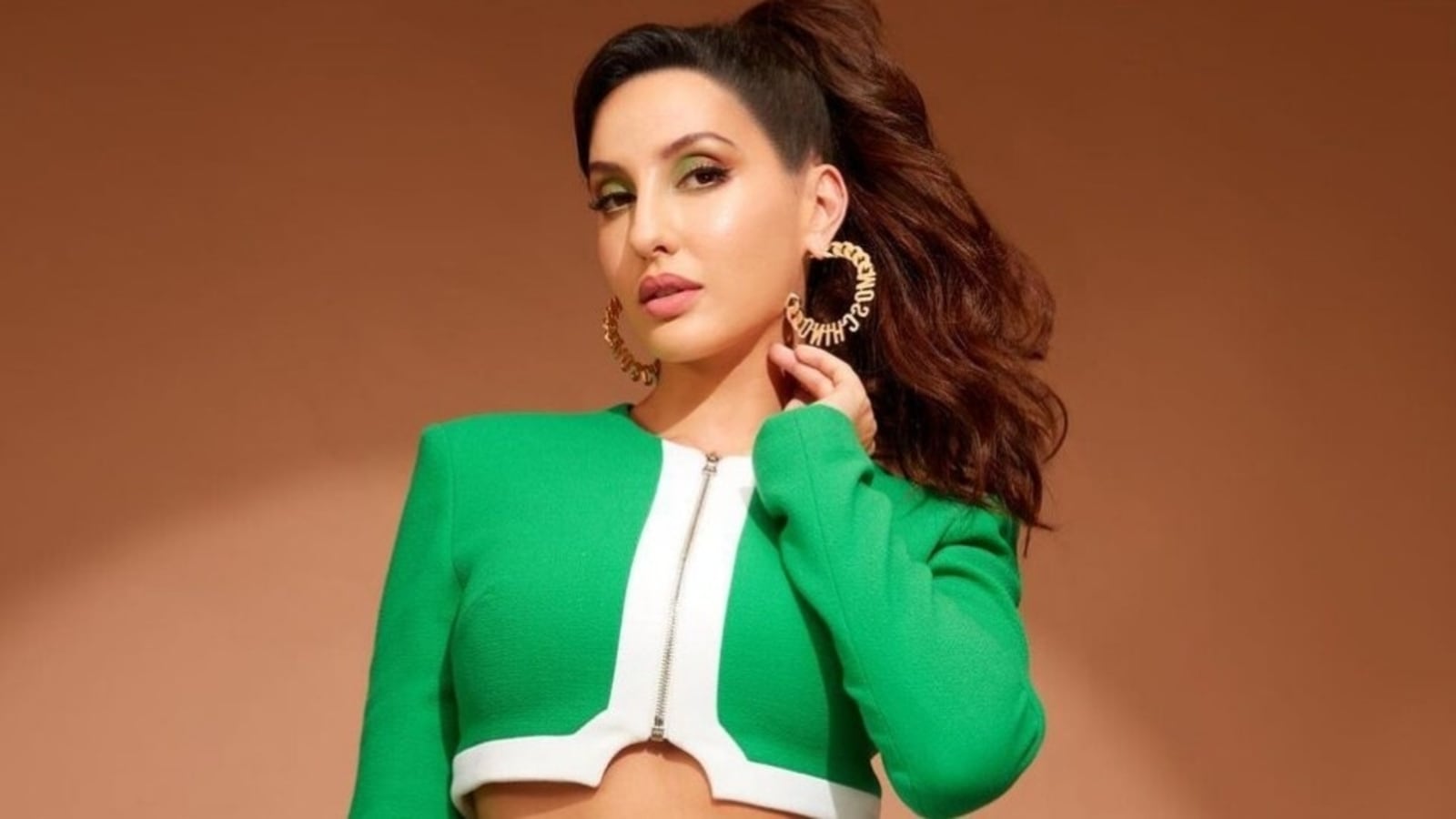 Nora Fatehi's Red Bikini Beach Photos: Bollywood Actress Sizzles In The Sun Nora Fatehi's Red Bikini Beach Photos: Bollywood Actress Sizzles In The Sun